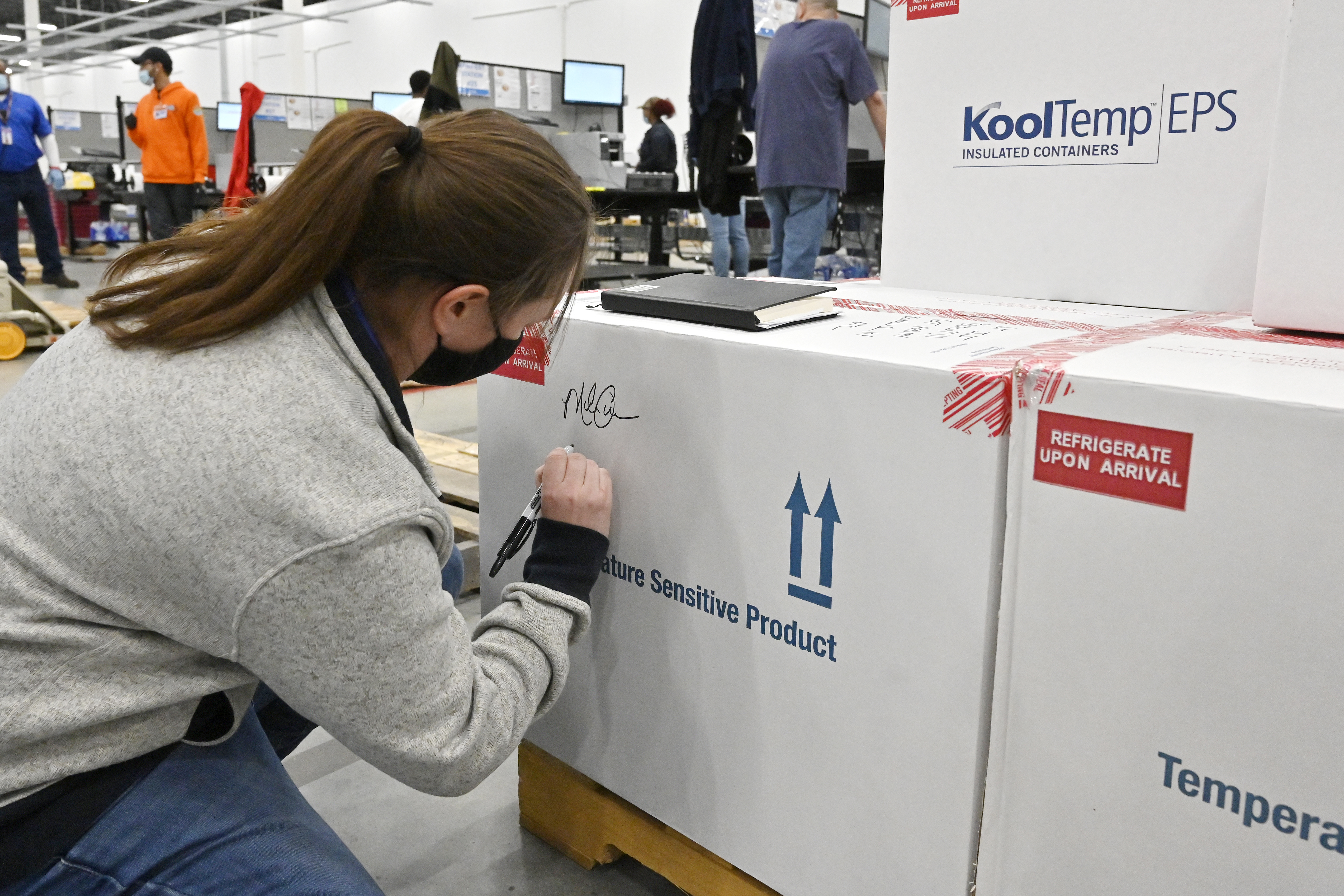 Photos: Johnson & Johnson ships millions of doses of coronavirus vaccine