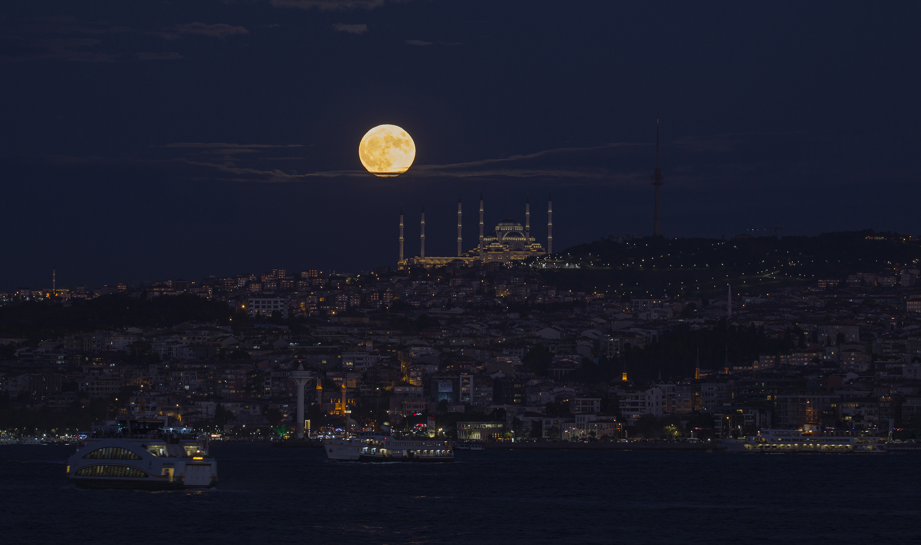 Photos: Halloween Blue Moon brightens the night sky
