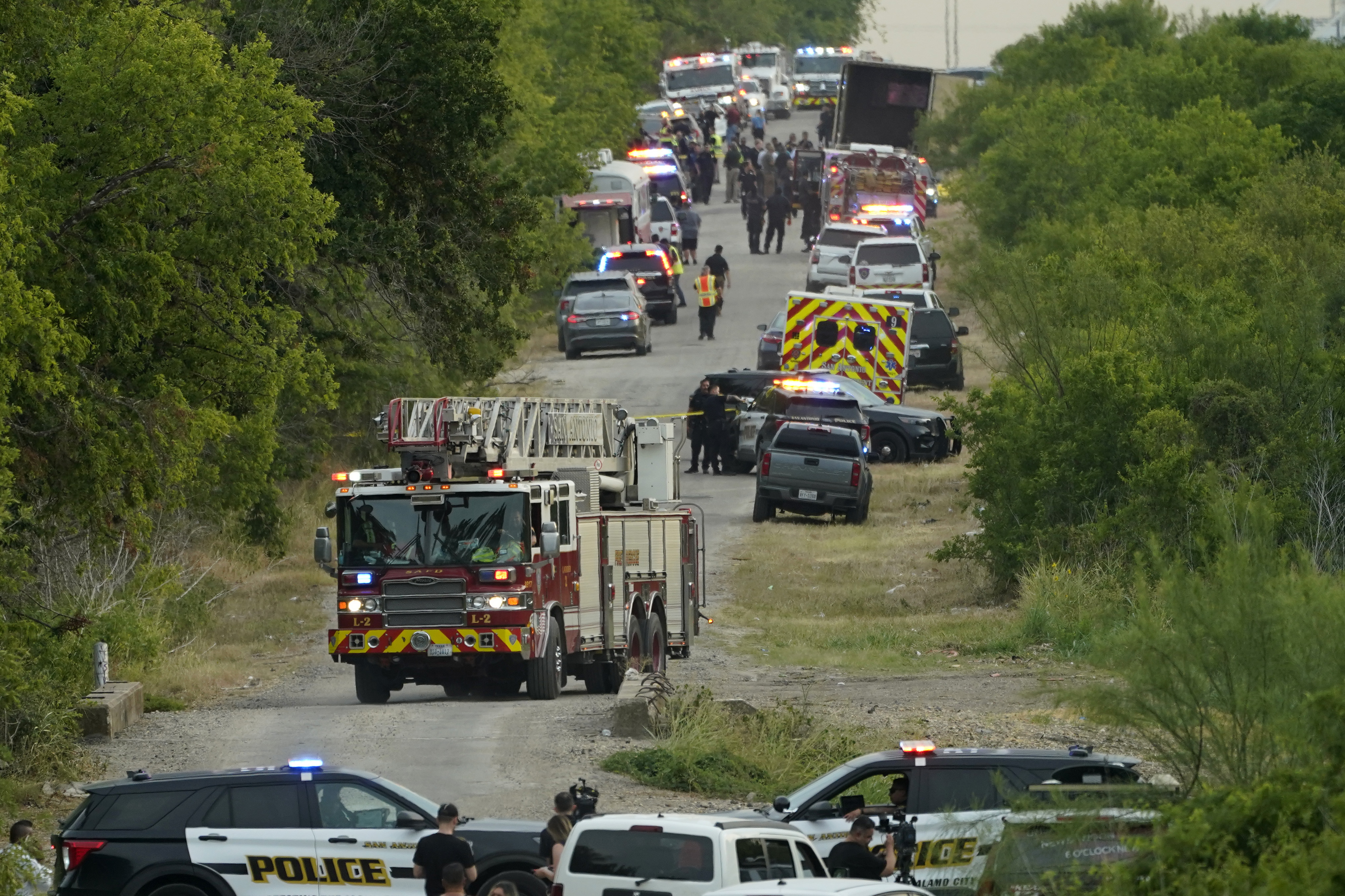 Photos: Dozens of suspected migrants found dead inside big-rig in San Antonio