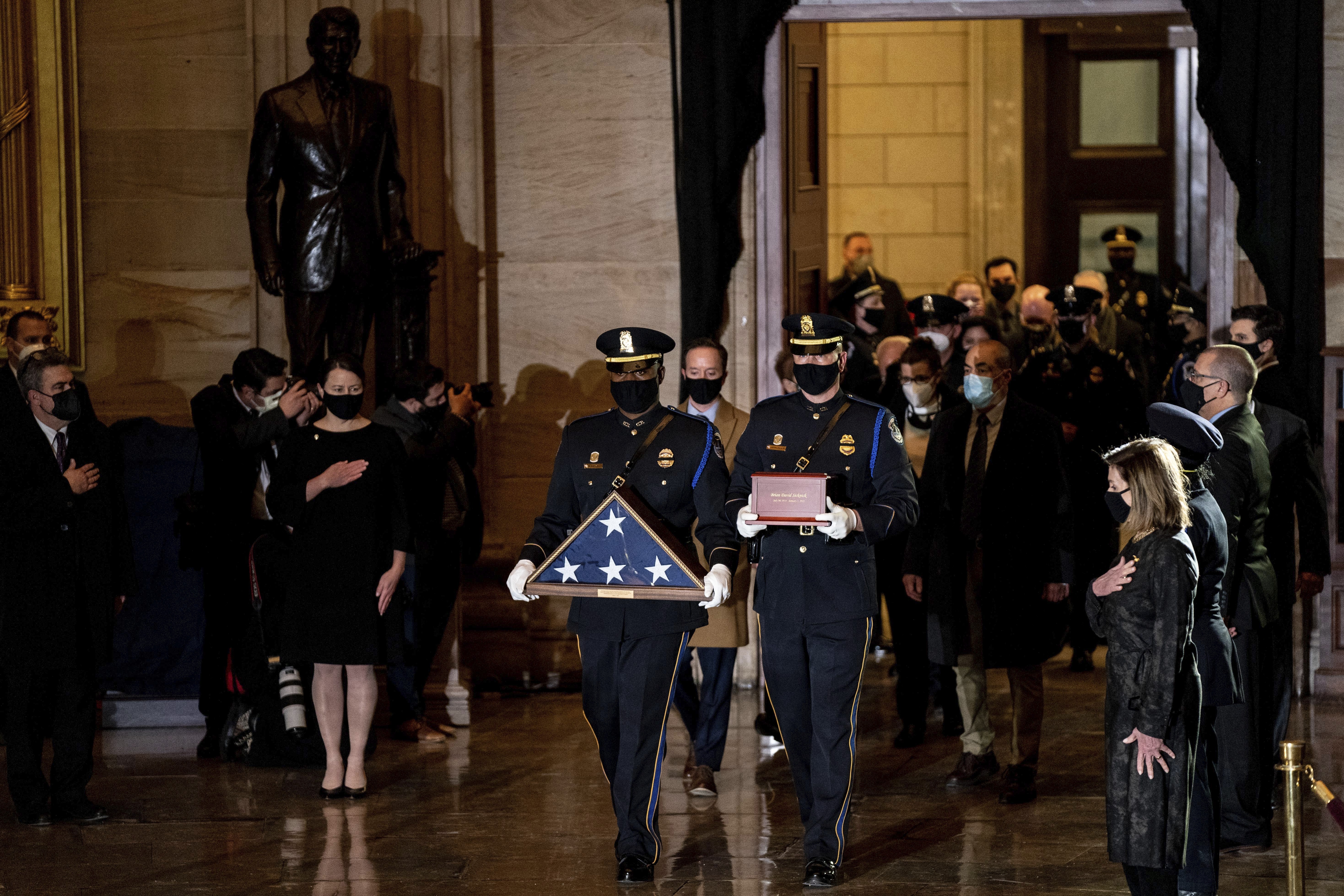 Biden, congressional leaders pay respects to Officer Brian Sicknick at US Capitol
