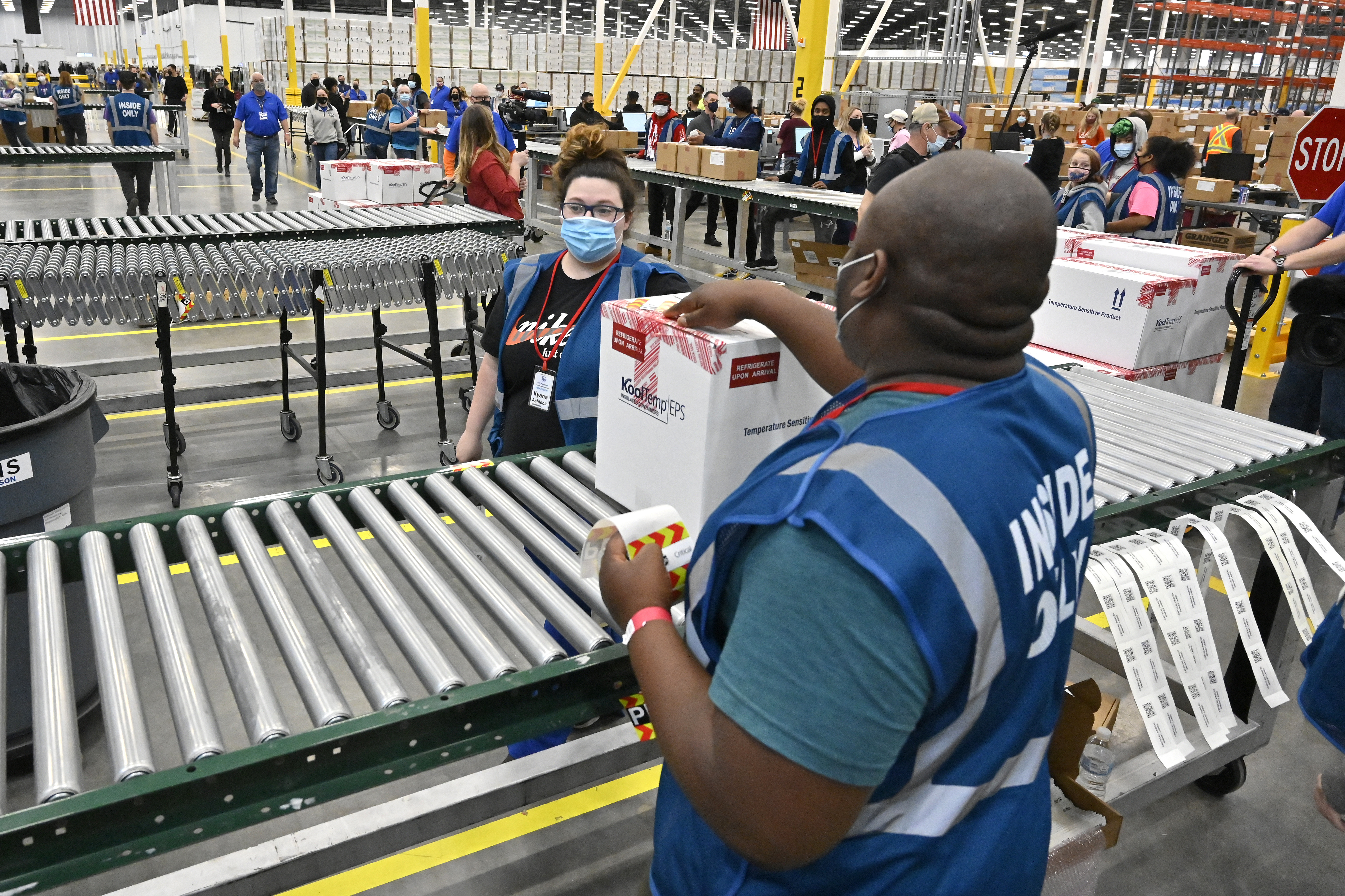 Photos: Johnson & Johnson ships millions of doses of coronavirus vaccine
