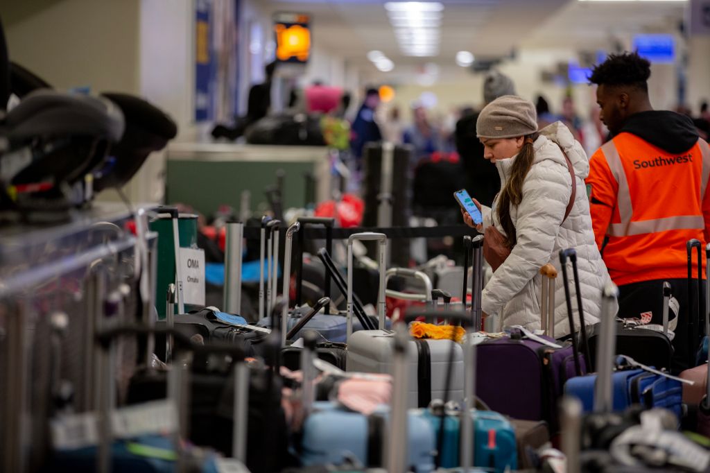 Passengers stranded, bags pile up as Southwest cancels flights