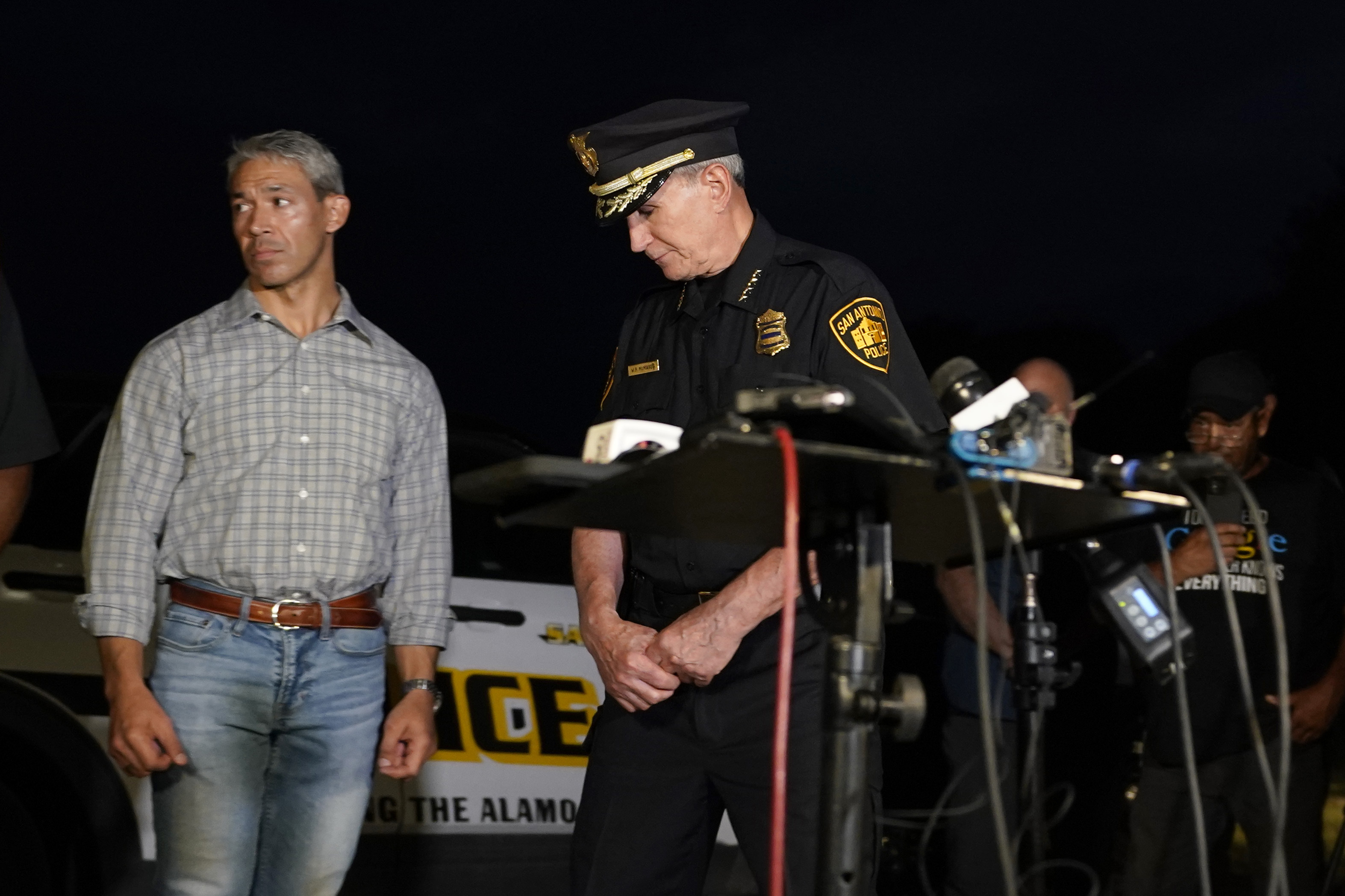 Photos: Dozens of suspected migrants found dead inside big-rig in San Antonio