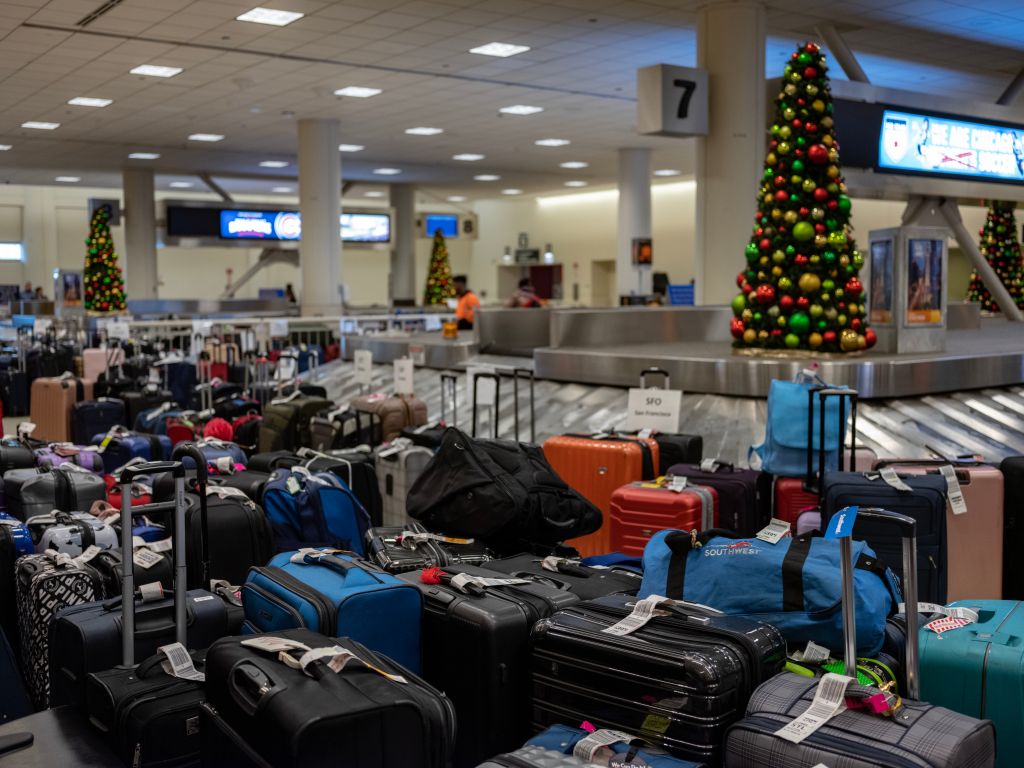 Passengers stranded, bags pile up as Southwest cancels flights