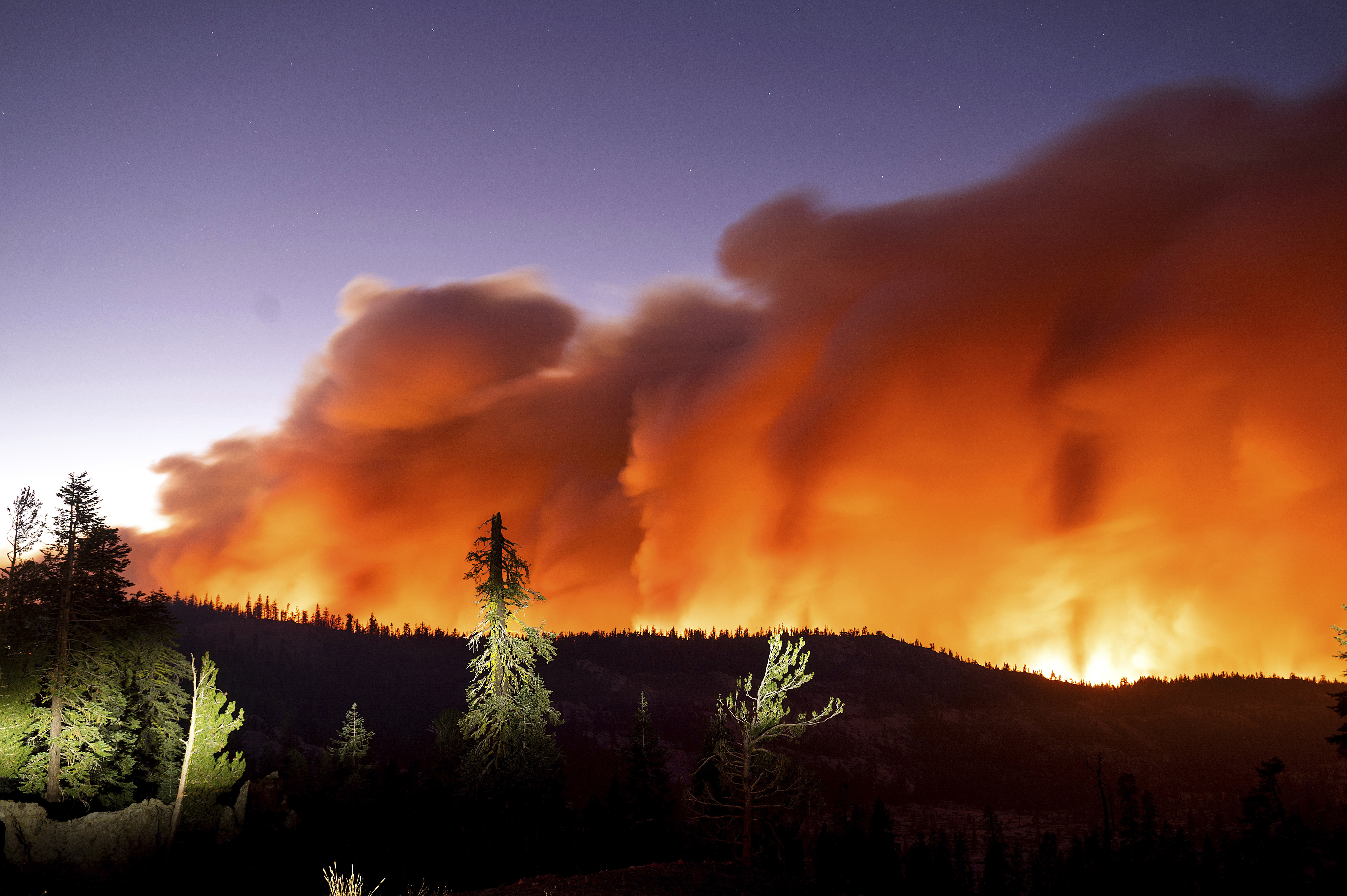 Photos: California's Caldor Fire triggers evacuations near Lake Tahoe