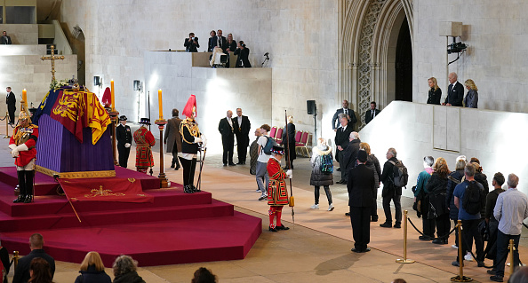 Bidens pay respects to Queen Elizabeth II