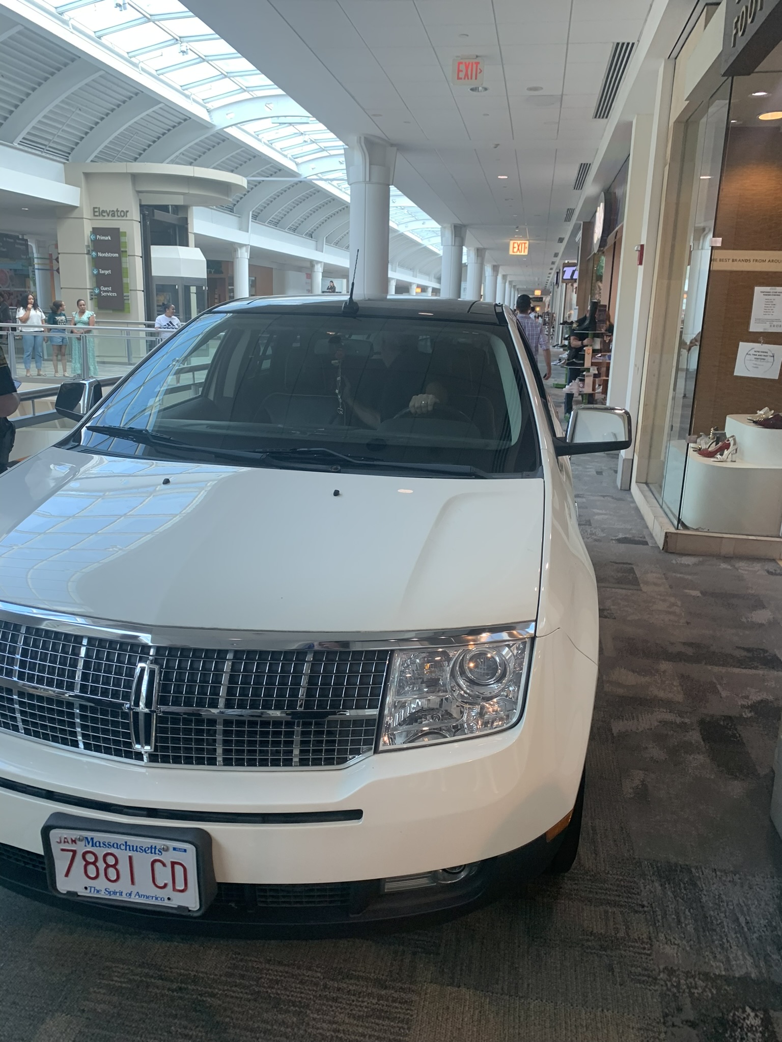 Woman drives SUV onto second floor of Massachusetts mall