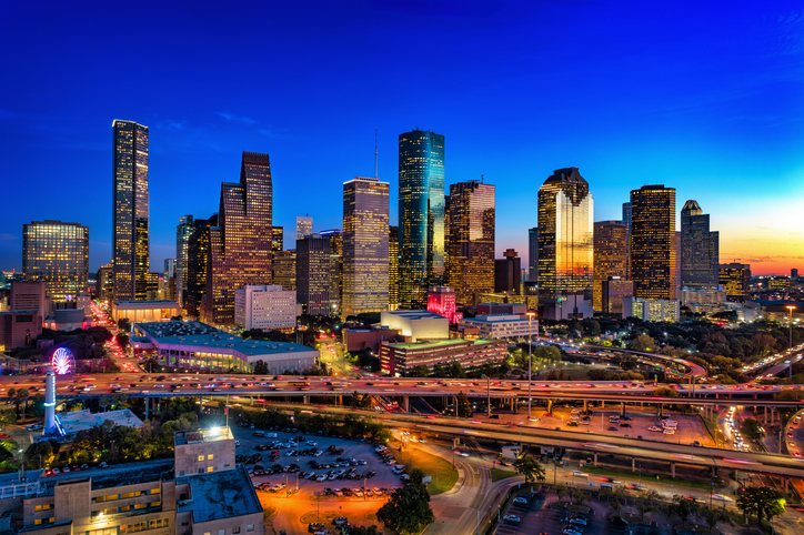 Houston Skyline Aerial At Dusk With Freeway