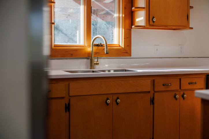 Open cabinets that hide water pipes