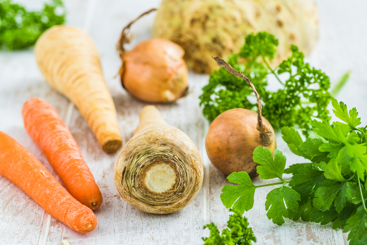 Vegetables and herbs for vegetable stock, soups, vegetable broth. Healthy and homemade food concept.