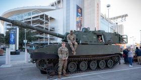 U.S. Military Members Pose with Tank