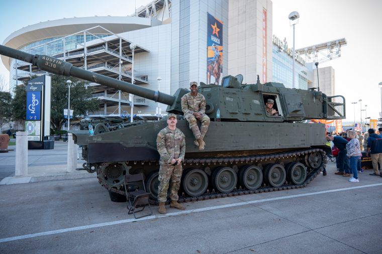 U.S. Military Members Pose with Tank
