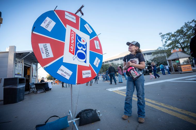 Young Fan Spins 93Q Wheel of Rodeo