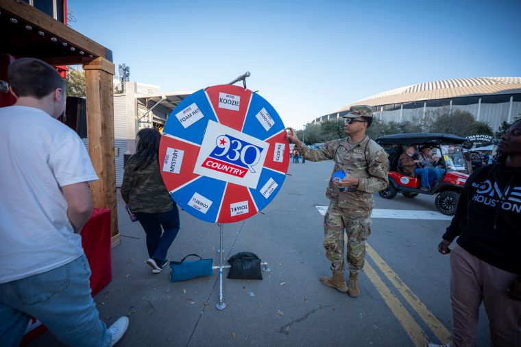 U.S. Military Member Spins 93Q Wheel of Rodeo