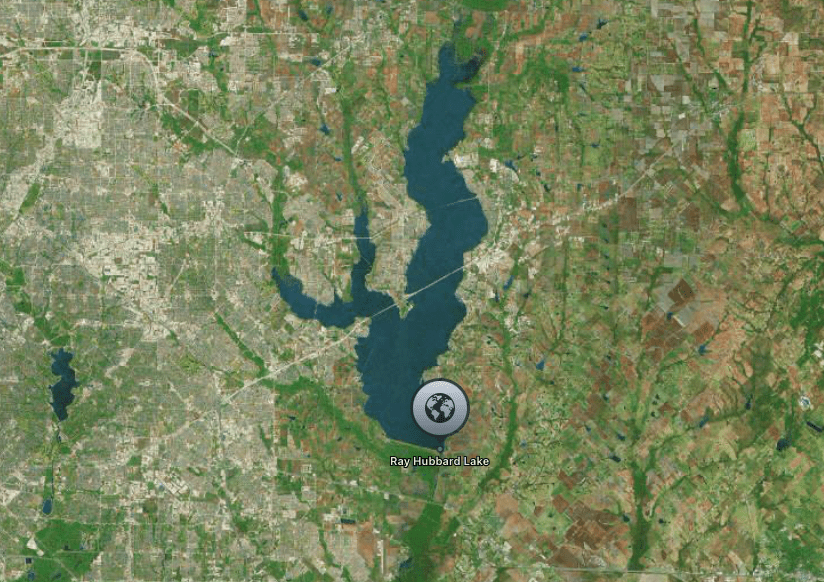 Aerial view of Ray Hubbard Lake surrounded by rural and suburban areas.