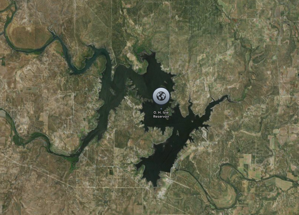 Aerial view of a large reservoir surrounded by rural countryside, with the text "O. H. Ivie Reservoir" visible.